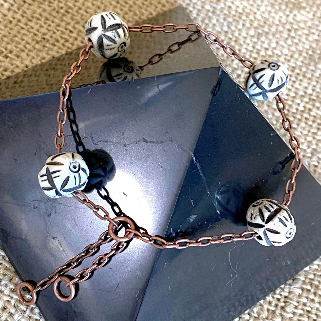 Medium Copper Topper with Black & White Carved Bone Beads